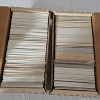 Two full boxes packed with vintage baseball and some basketball cards showing the breadth of the collection.