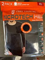 Front packaging of 2 pack men's base layer tops by Free Country Microtech Heat, size XL. Bag is orange and shows product visual and branding.