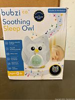 Photo of the Bubzi Co Soothing Sleep Owl box showing product features and packaging