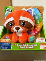 LeapFrog Colorful Counting Red Panda plush toy in its original packaging showing the front view with product label and interactive features.