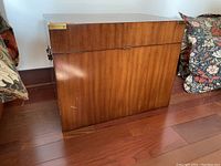 Front exterior view of chest showing mahogany veneer finish