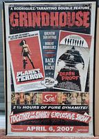Full view of vintage Grindhouse movie poster showing top to bottom with titles, images and promotional text.