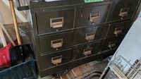 Front view showing nine drawers and label holders