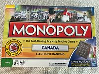 Monopoly Canada Electronic Banking board game box showing branding and features