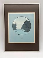 Full view of framed lithograph showing silver frame and mats