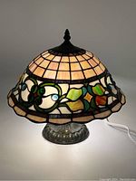 Front view showing lit shade pattern and base