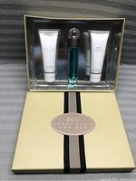 Original 360° Perry Ellis For Men set box opened showing three items: shower gel, fragrance spray, and after shave balm.