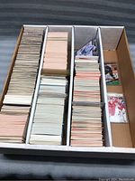 Overhead photo of the lot showing stacks of hockey cards in box dividers