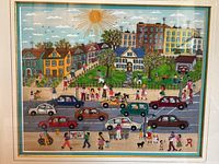 Full view of framed embroidered street scene