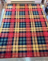 Full view of wool carpet laid flat on floor