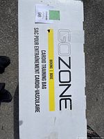 White cardboard box with GoZone branding and label indicating 'Cardio Training Bag' for boxing in English and French, showing item condition and model.