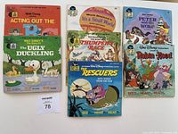 Six vintage Disney read along record books arranged in two rows of three. Each book has an illustrated cover with Disney characters and titles visible.