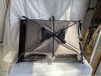 Top view showing the full fabric and support frame layout of the miniature Coleman tent