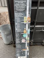 Full view of shower caddy box showing product name and basic features.