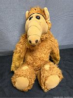 Front view of ALF plush toy showing full body, fur texture, and facial expression.