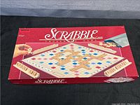 Closed box of Irwin Scrabble game with branding and game board illustration.