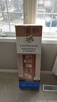 Mainstays 5-Shelf Bookcase in unopened box showing label and product image on front