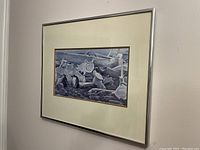 Framed art print showing the overall appearance hung on a wall with light silver metal frame and off-white matting.