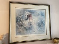 Framed print showing white horse in floral scene