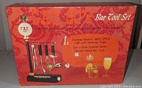 Vintage 1968 bar tool set in original box showing cordless electric light, four chrome plated bar tools with black handles, and cocktail guide, brand Royal London Ltd