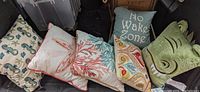 Overview of all five pillows including ocean and dinosaur themes