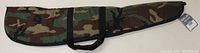 Full view of camo-patterned soft long gun case with zipper and carrying strap handles.