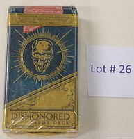 Front view of unopened Dishonored Tarot Deck box showing gold skull illustration and game of the year edition label