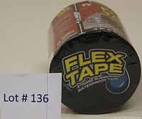 Front view of shrink-wrapped Flex Tape roll showing product name, size, and branding.