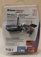 Camera in sealed original packaging showing label and product details on front