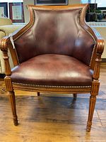 Front view of leather and wood chair