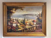 Front view of entire painting and frame against a wall