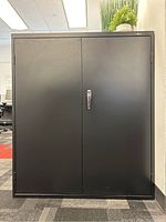 Front view of cabinet with doors closed