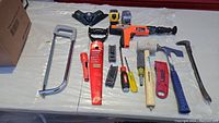 Overview of all tools laid out on plastic sheet