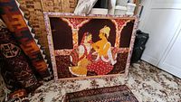Antique Indian textile art framed fabric with painted couple seated, showing damage on top left corner