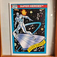 Front of Silver Surfer Marvel Super Heroes 1990 trading card showing artwork and title.
