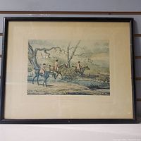 Front view of the framed hunting scene print showing three riders on horseback in a natural setting with a stream and trees.