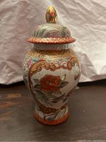 Front and side view of Satsuma style ginger jar showing detailed floral and scroll designs with a cracked glaze finish