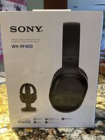Front of the sealed retail box of Sony WH-RF400 wireless stereo headphones showing product image and model.