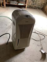 Full view of Danby dehumidifier showing front air vent and unit shape.