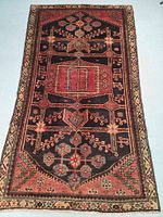 Full view of rug laid flat on floor showing overall design and color