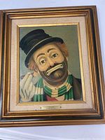 Frontal view of the framed painting showing entire composition and frame