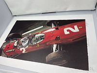 Full view of the signed lithograph Grand Prix, Troy 04 showing the red race car in a racing scene.