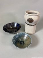 Set of three signed Kayo O'Young pottery pieces: tall vase and two bowls