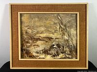 Full view of framed oil painting showing abstract landscape scene and textured fabric mat with light wood frame.
