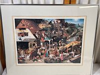 Full view of the framed Flemish Proverbs print showing the entire artwork in its frame with matting.