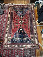 Full view of carpet laid on wooden floor