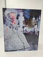 Front of display box showing Madame du Barbie in ballroom gown and printed interior scene