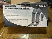 Box label showing RENPHO brand, model RF-ALM070, features including easy-to-use controller, full leg and feet coverage, skin-friendly cloth, four compression intensities, three automatic sequences and three modes.