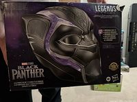 Photo of the Black Panther electronic helmet box showing the product image, branding, and features.