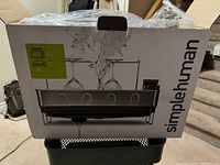 View of the Simplehuman dish rack box showing the design and product image.